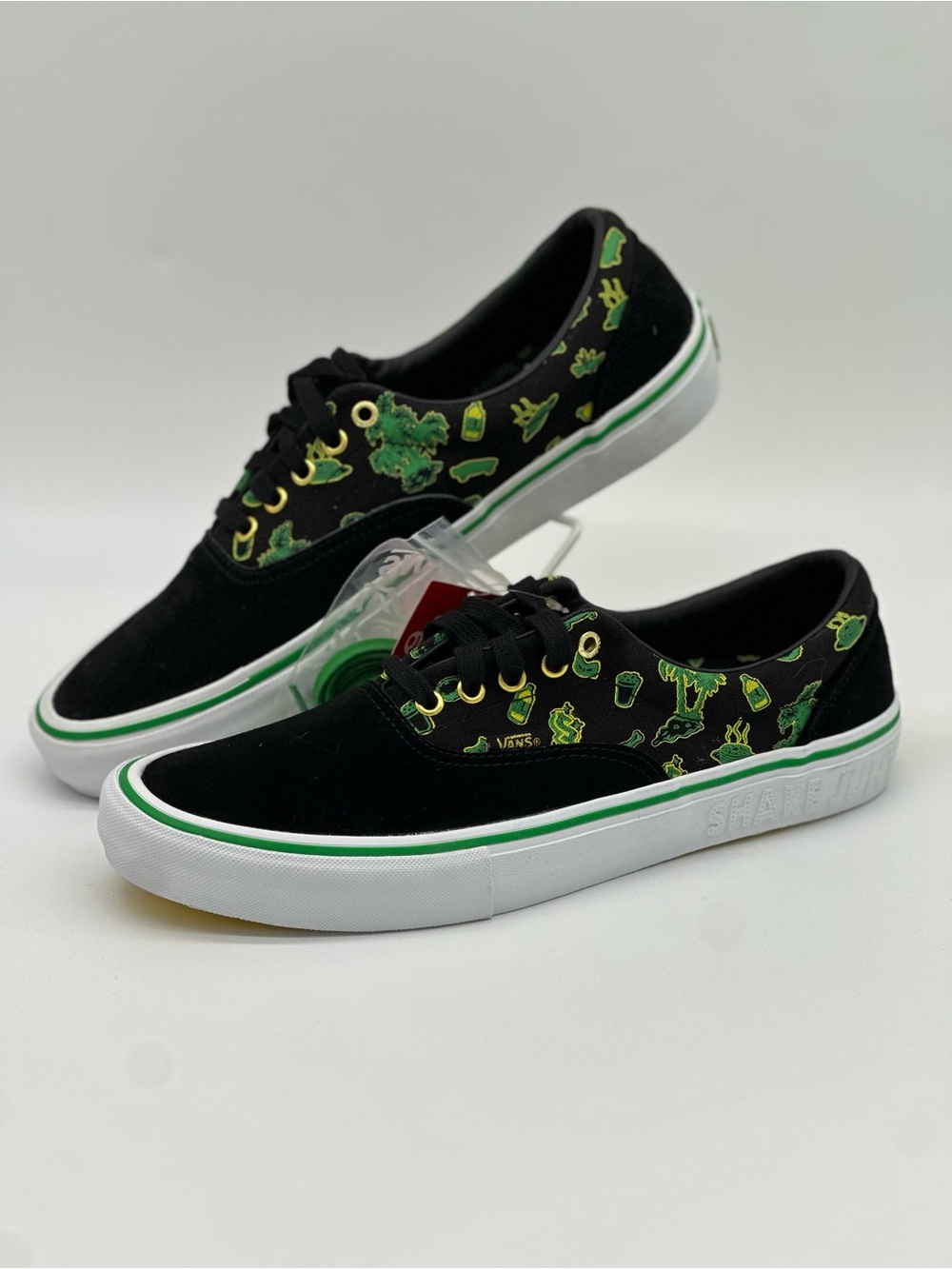 Vans Black Low-Top Sneakers with Green Graphic Accents